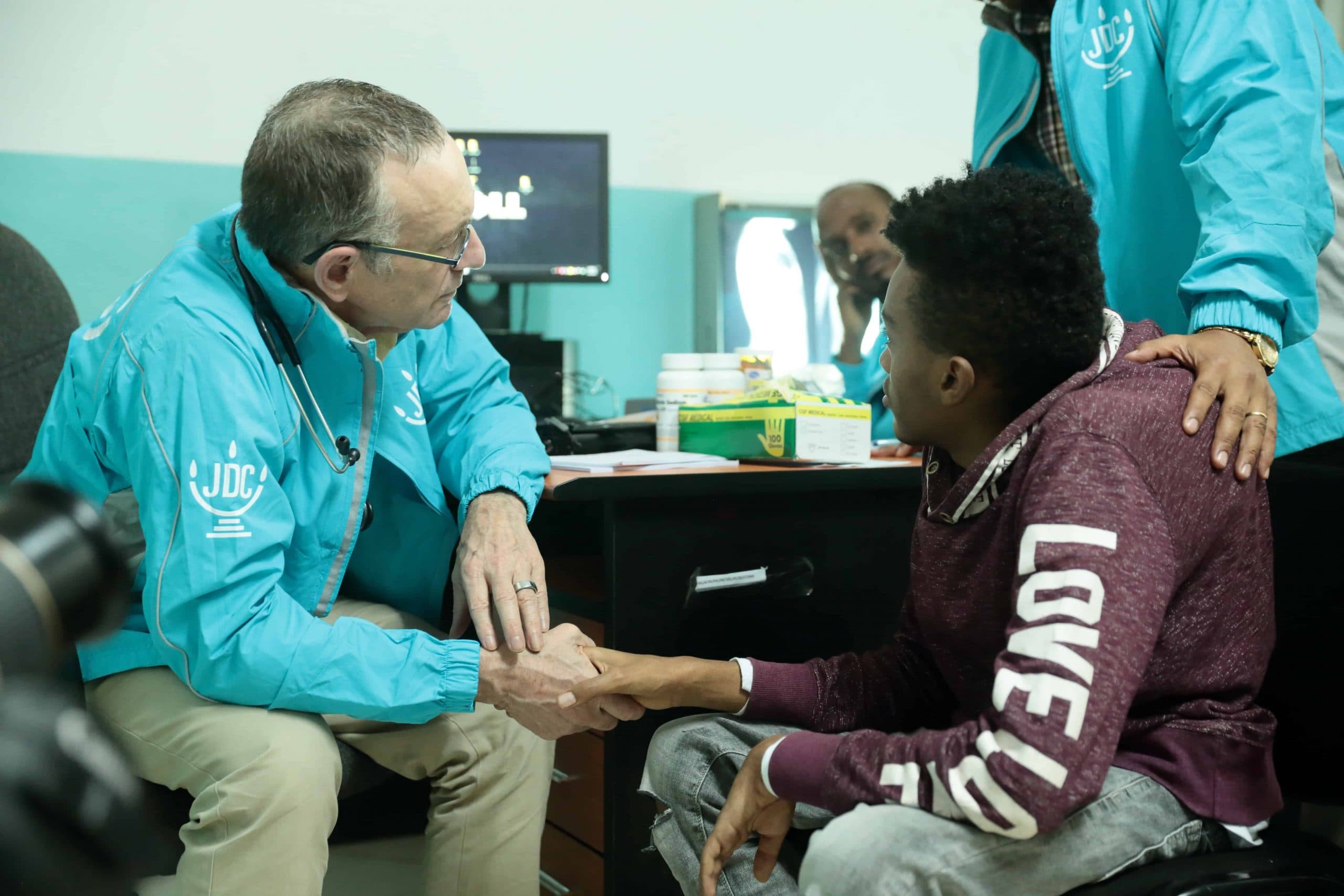 Dr. Rick Hodes meets with a young patient