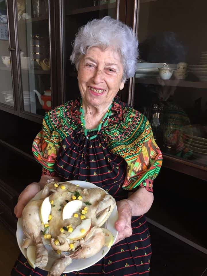 Meri Zegelman, an Internally Displaced Person in Ukraine who was helped by JDC, shows off some of her cooking.