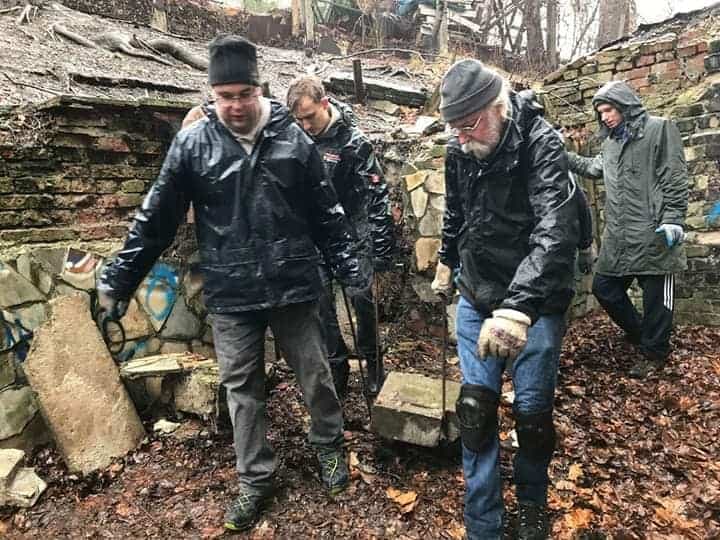 Sasha Nazar and a team of volunteers clean up a Jewish cemetery in a small town outside Lviv, Ukraine.