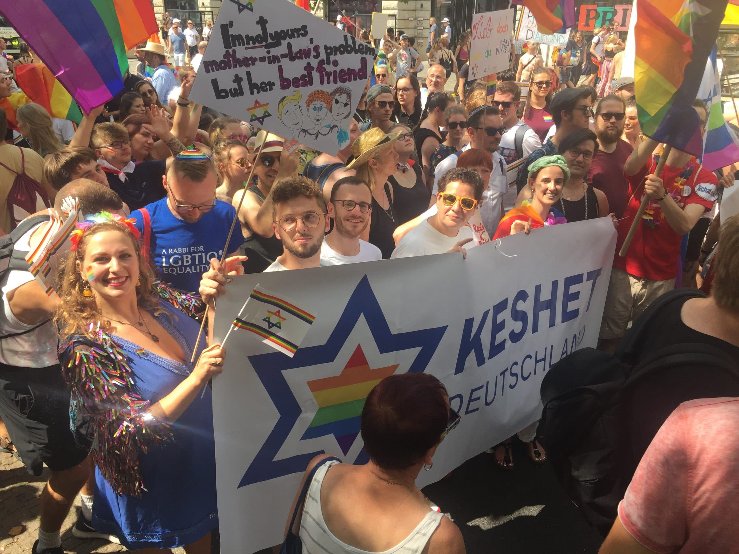 Keshet members march together in a Pride parade.