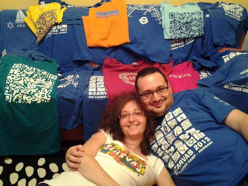 Andras-and-his-wife-laying-on-shirts.jpg