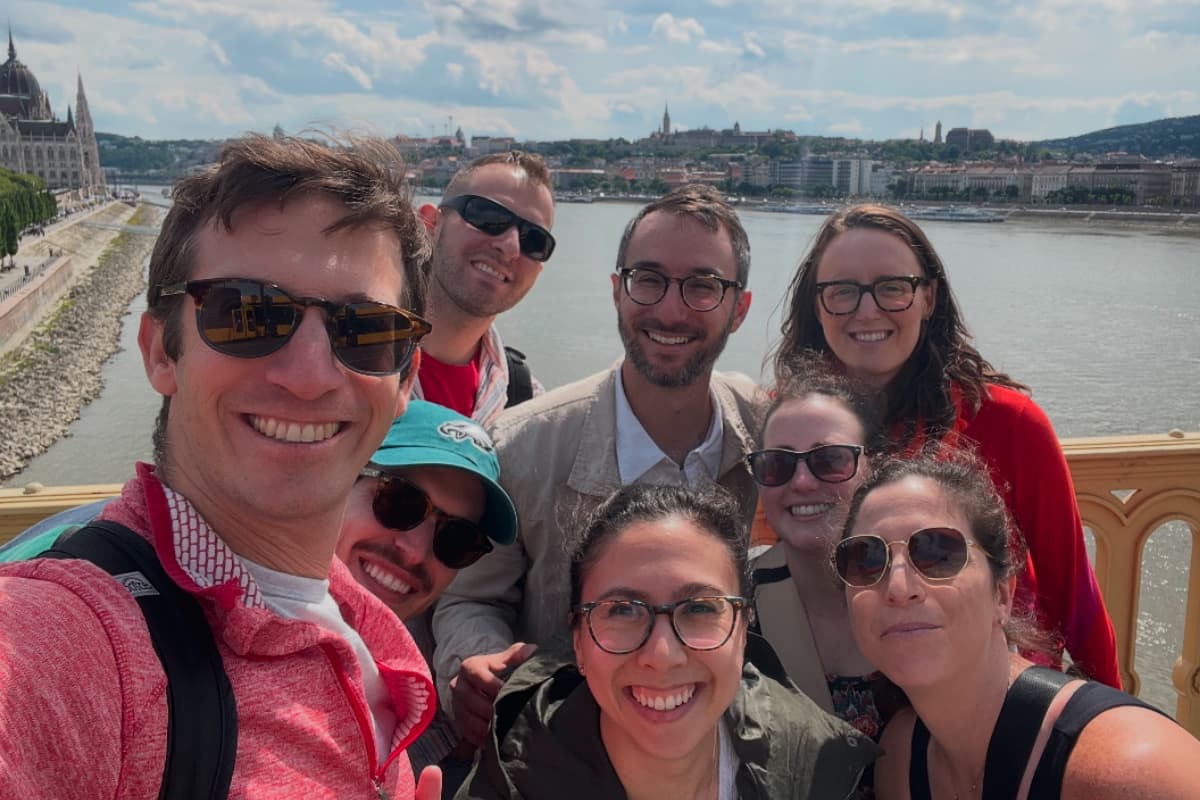 Rabbi Michael Lewis, far left, poses with congregants on a trip to Budapest.